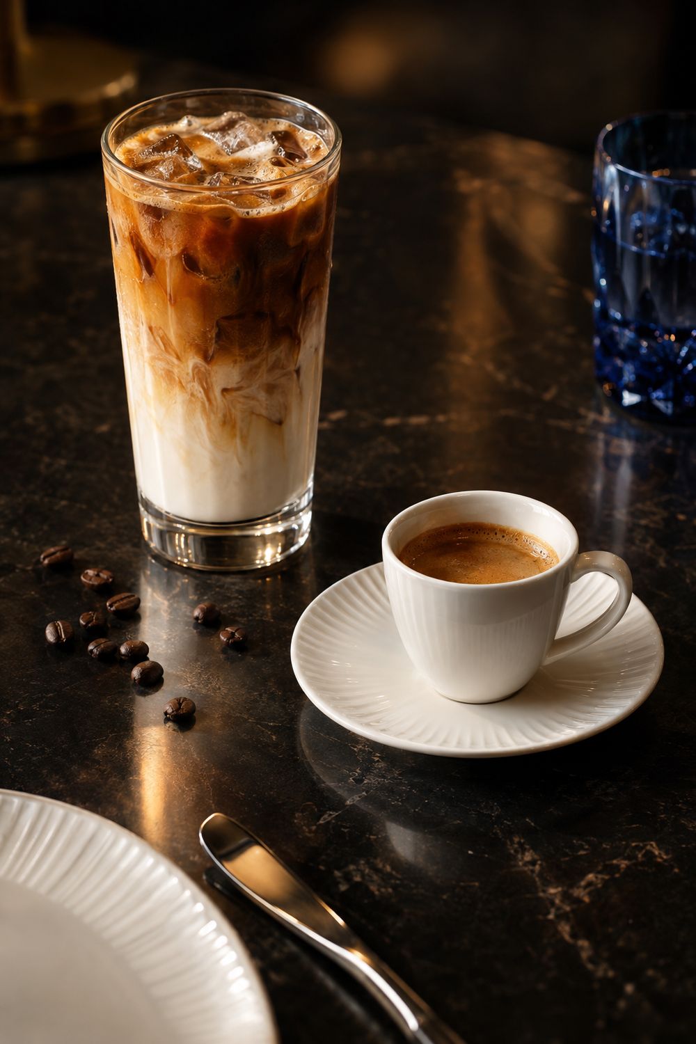 Spanish latte and espresso served on pearl-white porcelain